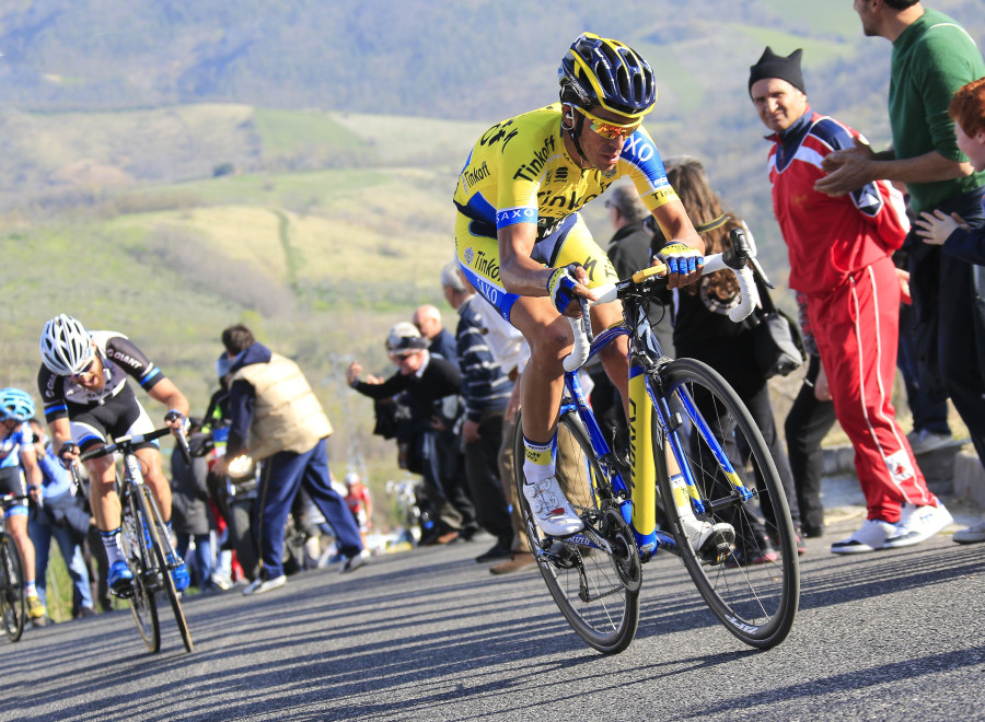 Contador catches then passes the front of the race on the 30% climb.